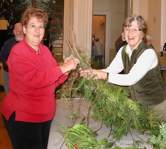 An image of Ancaster Horticultural Society members creating a table display.